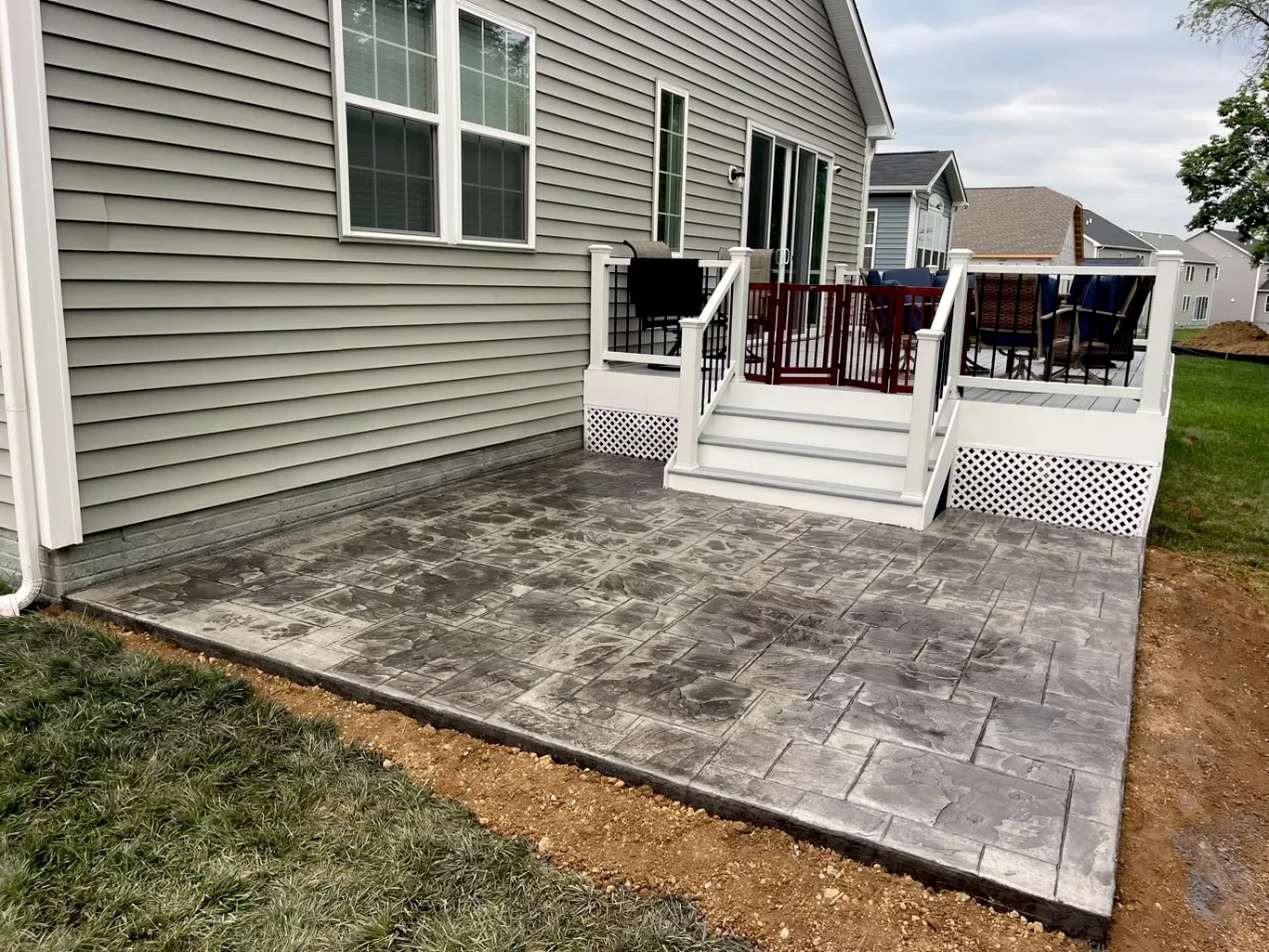 Residential paved patio with steps